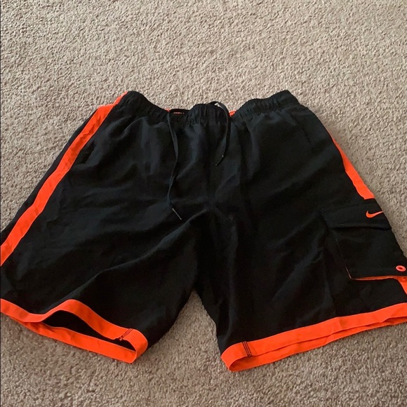 black orange and white nike shorts